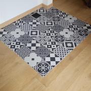 Pose de carrelage encastré dans parquet