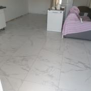 Pose d'un carrelage 60x60 sur une surface de 90m2